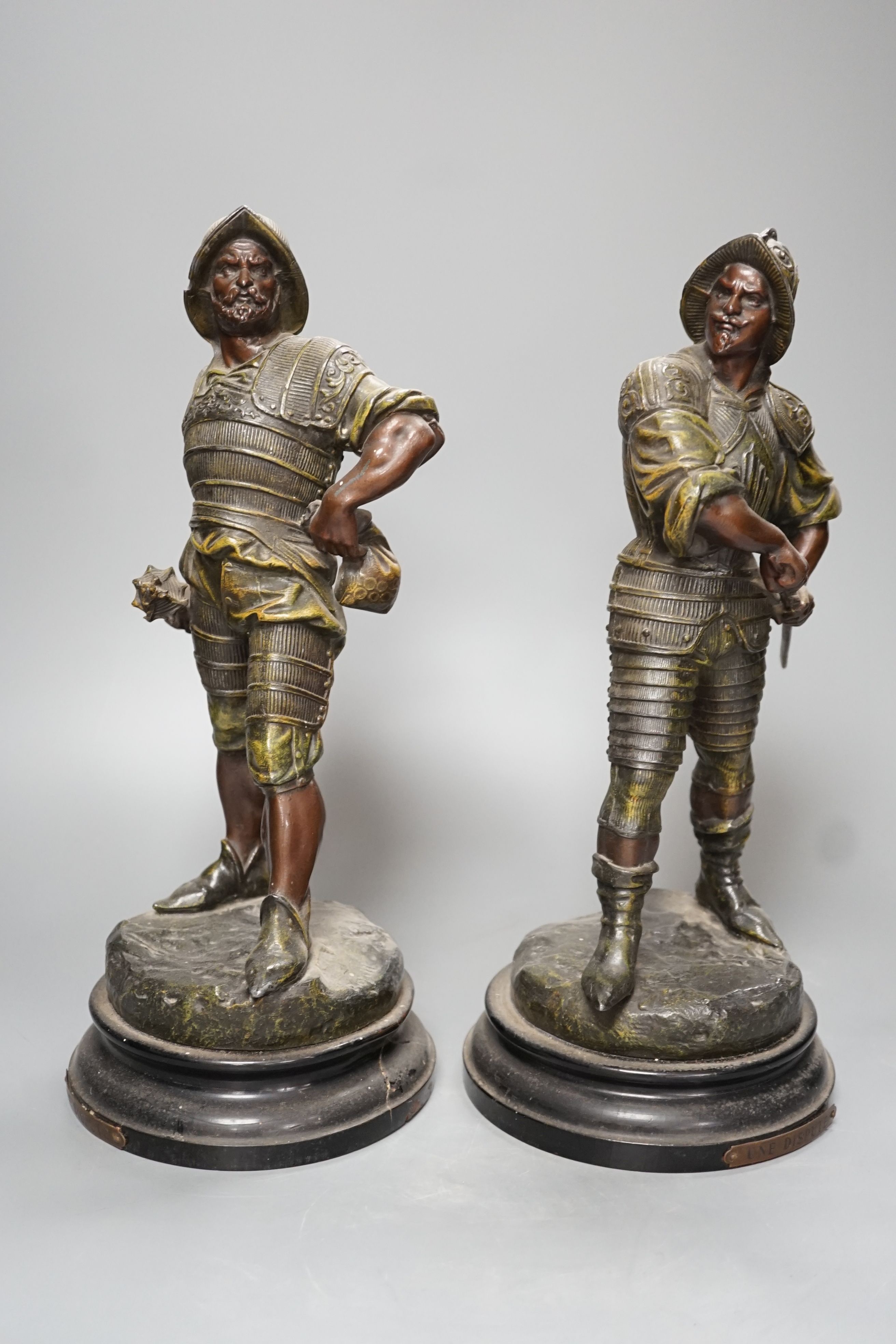 A pair of late Victorian bronzed spelter figures of 17th century soldiers - 33cm high